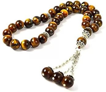 golden and black prayer beads